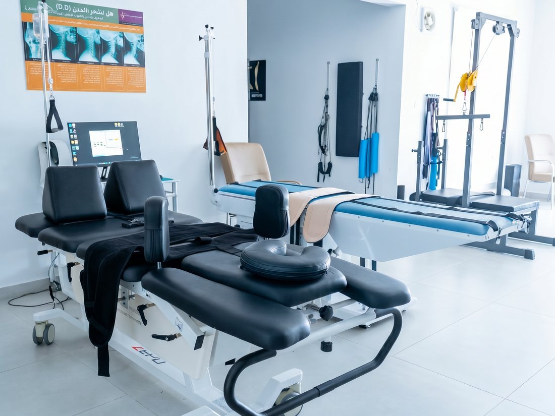 Spinal decompression and traction tables in the treatment room